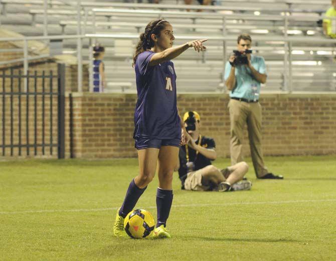 LSU junior midfielder Natalia Gomez-Junco (11) prepares to throws a free kick Friday, August 29, 2014 during the Tigers' victory 6-2 against Northwestern St. in LSU Soccer Stadium.