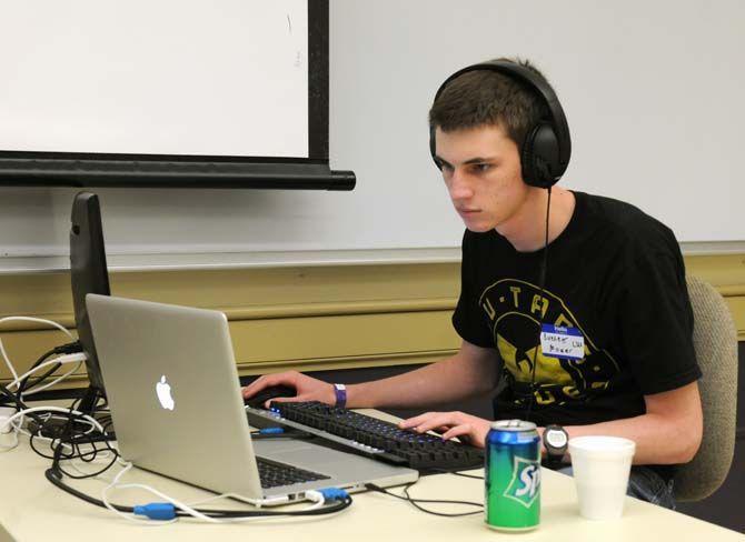 LSU student Everett Moser concentrates during LSU's first 24 hour hackathon GeauxHack on Saturday, August 30, 2014.