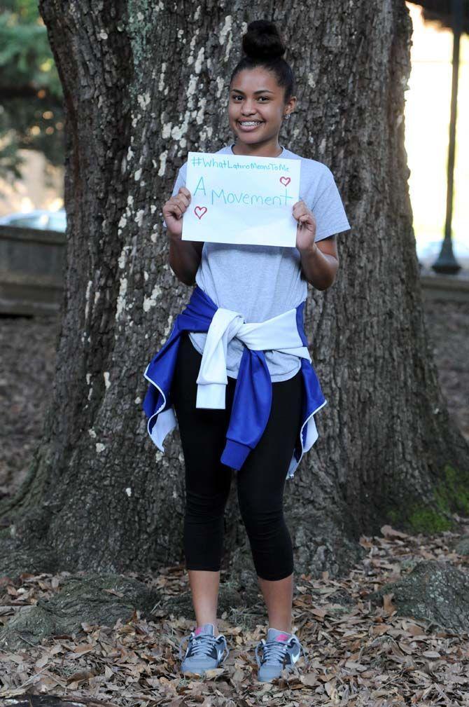 The Hispanic Student Cultural Society make signs about what being Latino means to them.