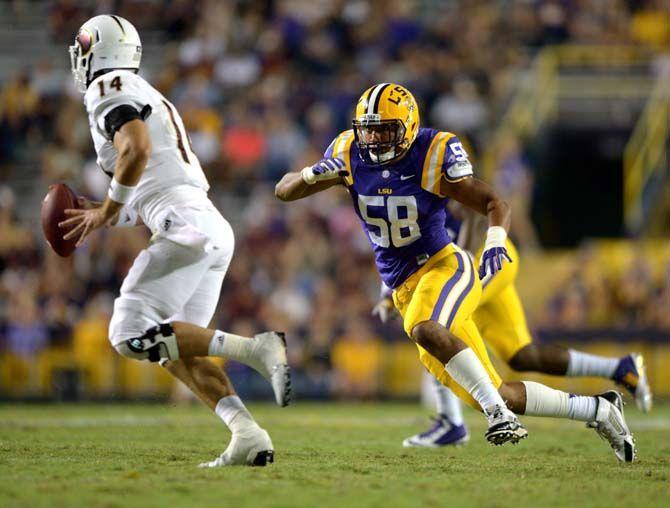 LSU freshman defensive end Sione Teuhema runs after ULM player Saturday, Sep. 13, 2014 during the Tigers' 31-0 victory against Warhawks in Tiger Stadium.