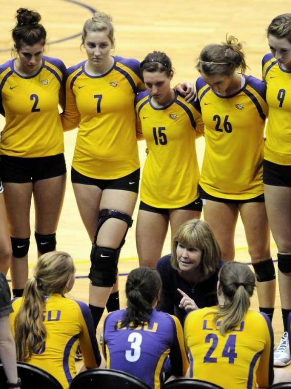 LSU women's volleyball head coach Flan Flory talks to players during a timeout Wednesday, Oct. 3, 2012 during the Tigers' match against Georgia in the PMAC.