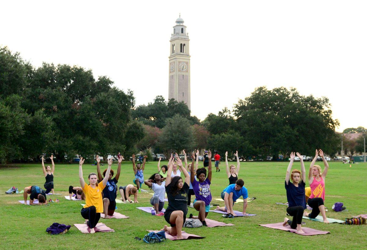 LSU's Urec has outside yoga class students pose warrior September 17, 2014.