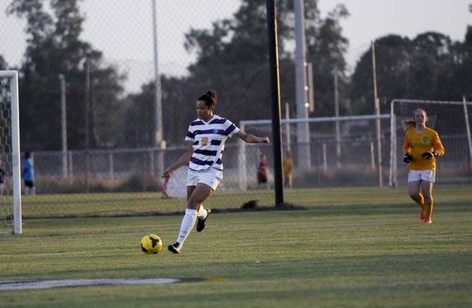 LSU freshman defender Jordane Carvery (2) passes the ball Friday, August 22, 2014 during the Tigers' 2-0 victory against Troy in LSU Soccer Stadium.