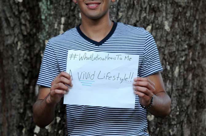 The Hispanic Student Cultural Society make signs about what being Latino means to them.