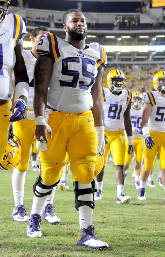 LSU senior center Elliott Porter (55) leaves the field after LSU loses to Mississippi 34-29 in Tiger Stadium Saturday September 20, 2014.