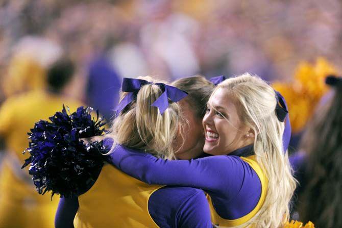 LSU cheerleaders celebrate a touchdown in Tiger Stadium in a winning game against Ole Miss 10-7 Saturday, October 25, 2014.