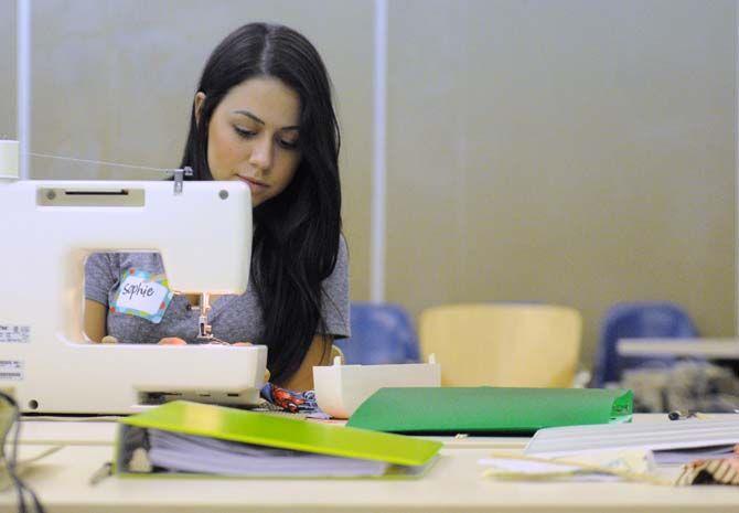 LSU textiles and apparel merchandising senior Sophie Babin participates in a sewing class which makes pillows to be sent to cancer services.