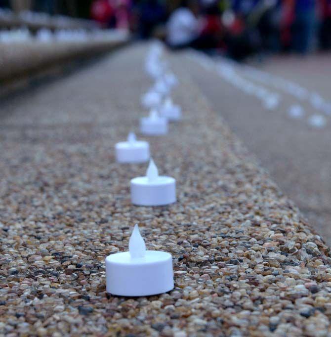 LSU Student Health Center and LSU Women's Center staged event "Take Back the Night" to combat domestic violence and sexual assult.