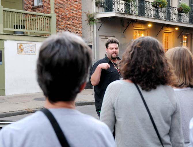 French Quarter Phantoms guide, Luke, shares old New Orleans legends and folklore of the city with participants.