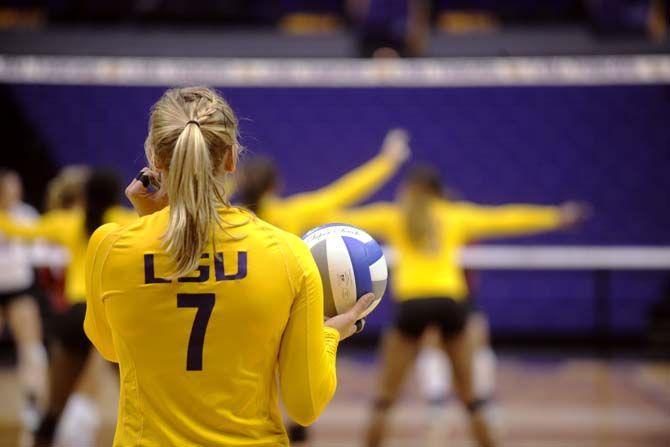 LSU junior outside hitter Katie Lindelow gets ready to serve Sunday, October 5, 2014 in the victory against Arkansas 3-2 in the PMAC.