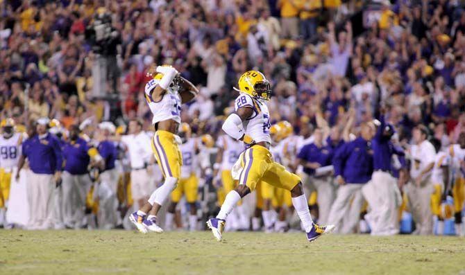 LSU junior safety Jalen Mills (28) and junior cornerback Jalen Collins celebrate a play from the Tigers in a winning game against Ole Miss 10-7 in Tiger Stadium Saturday, October 25, 2014.