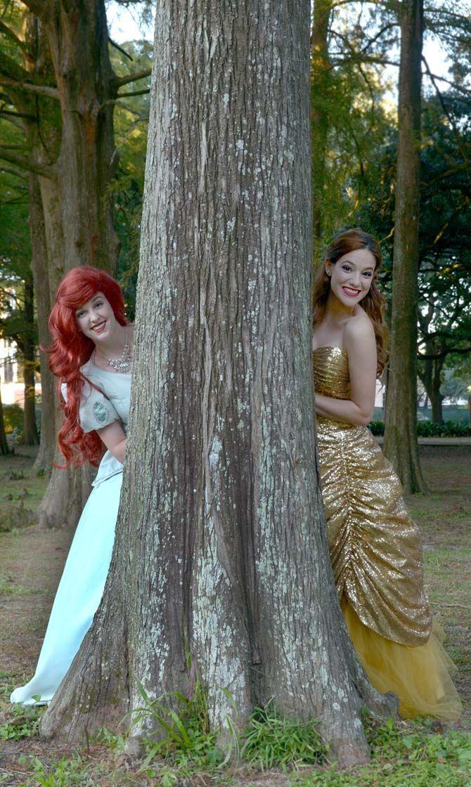 LSU junior digital advertising major, Reagan May (Mermaid Princess/left) poses with sophomore education major, Corinna Cherrier (Beauty/right), for May's business, started in July, called "Rent a Princess" where the girls are hired for birthday parties and other events