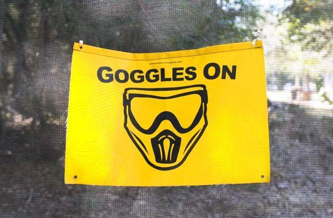 A safety sign hangs at Paintball Command in Mandeville.