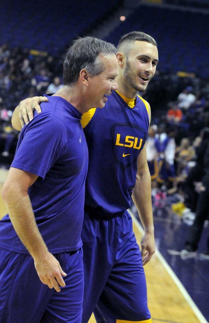 LSU men's basketball junior guard, Keith Hornsby (4), participates in a shoot out with LSU President F. King Alexander at Basketball Bayou Madness in the PMAC on Friday, October 17.