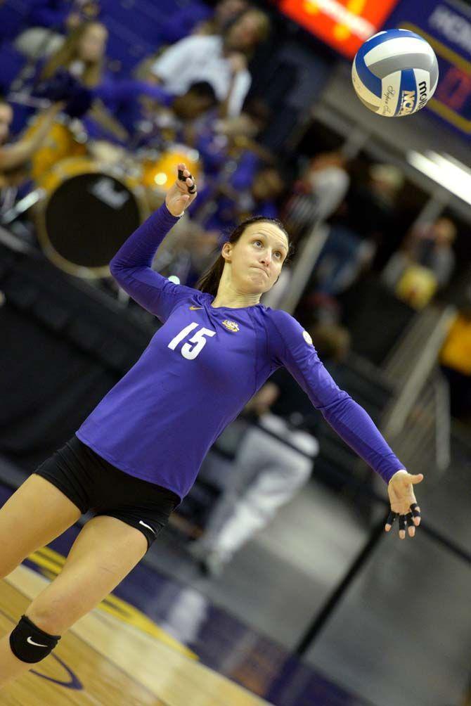 LSU junior defensive specialist Haley Smith (15) serves the ball Wednesday in the PMAC where LSU won 3-0 against Mississippi State.