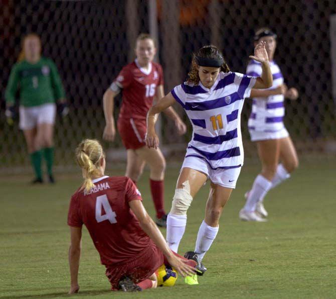 LSU junior midfielder Natalia Gomez-Junco (11) contends for the ball during Tigers' 2-3 defeat against Alabama Thursday, October 9, 2014 in the LSU Soccer Stadium.