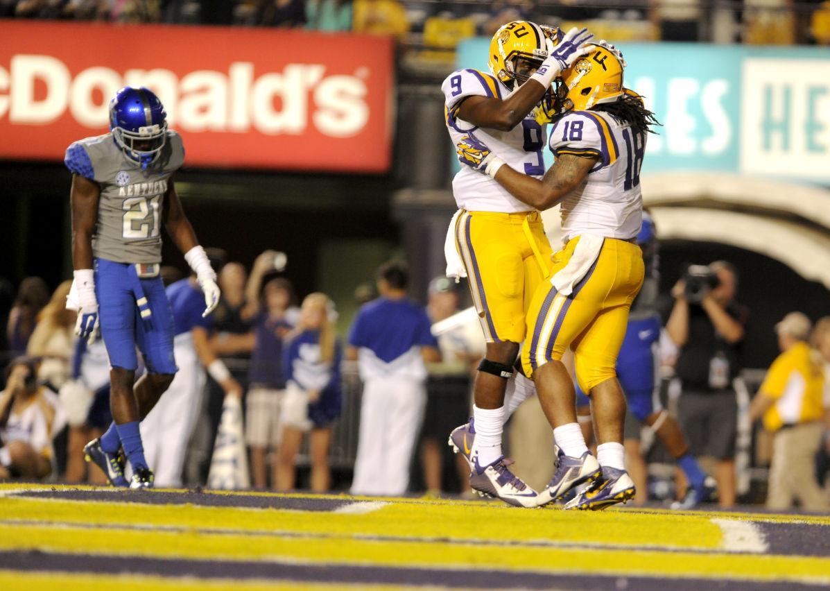 Freshman wide receiver John Diarse (9) and senior running back Terrence Magee (18) celebrate during the Tigers' 42-3 victory against Kentucky on Saturday, October 18th, 2014.