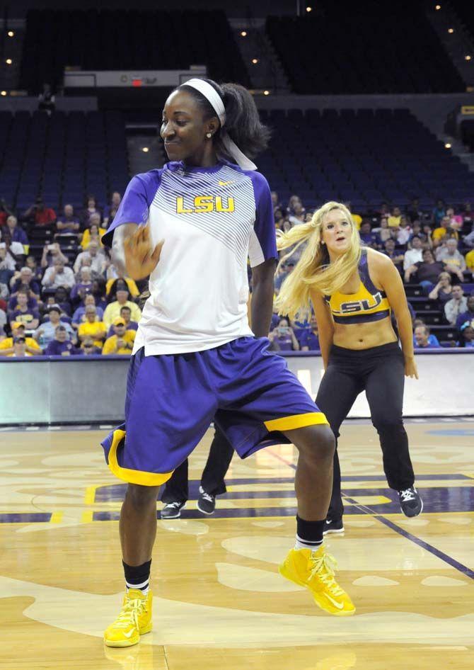 LSU women's basketball sophomore guard, Raigyne Moncrief (11), dances with the Tiger Girls during Basketball Bayou Madness in the PMAC on Friday, October 17.