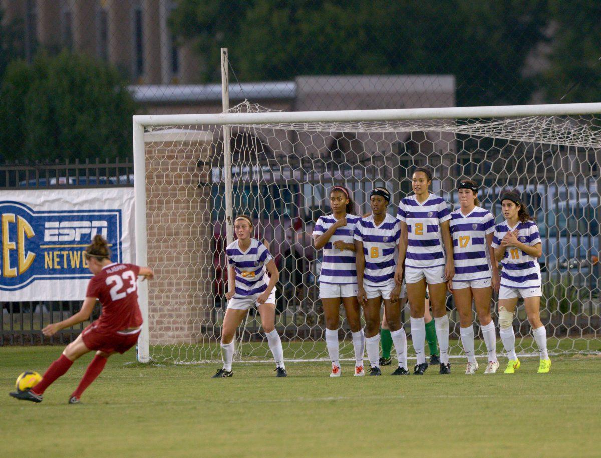 Alabama senior midfielder Merel Van Dongen (23) shoots a free kick to score Alabama's first goal during Tigers' 2-3 defeat Thursday, October 9, 2014 in the LSU Soccer Stadium.