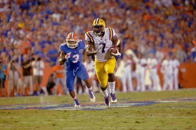 LSU freshman running back Leonard Fournette (7) runs the ball Saturday, October 11, 2014 during the Tigers' 30-27 victory in Ben Hill Griffin Stadium.