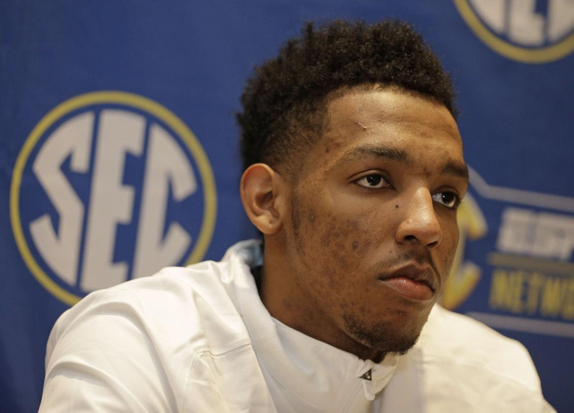 Georgia's Charles Mann listens to a question during a news conference at the Southeastern Conference NCAA men's college basketball media day in Charlotte, N.C., Wednesday, Oct. 22, 2014. (AP Photo/Chuck Burton)