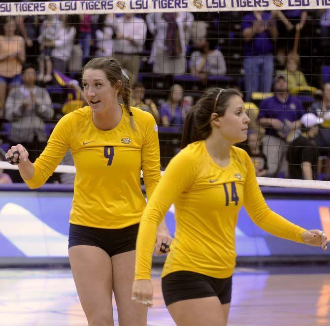 LSU senior middle blocker/right side Madi Mahaffey (9) encourages her teamates during Tiger's 3-2 victory against Arkansas Sunday, October 5, 2014 in the PMAC.