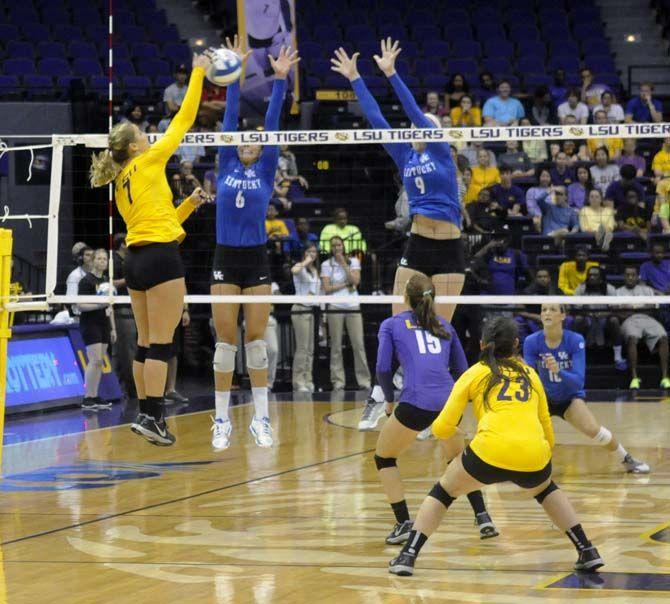 LSU volleyball junior Outside Hitter Katie Lindelow (7) jumps to spike the ball during the loss aginst Kentucky Wednesday, September 24, 2014 in the PMAC.