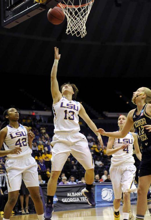 LSU freshman guard Rina Hill (13) shoots the ball Sunday, March 23, 2014, during the Tigers' 98-78 victory against Georgia Tech in the PMAC.