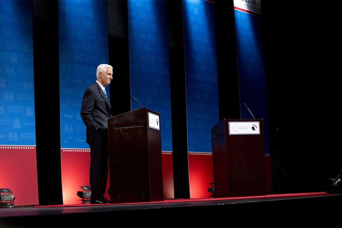 Democratic challenger Charlie Crist waits for Florida Gov. Rick Scott to start their second debate, Wednesday, Oct. 15, 2014 in Davie, Fla. Scott delayed the start of the debate because of an electric fan below Crist's podium. (AP Photo/Wilfredo Lee)