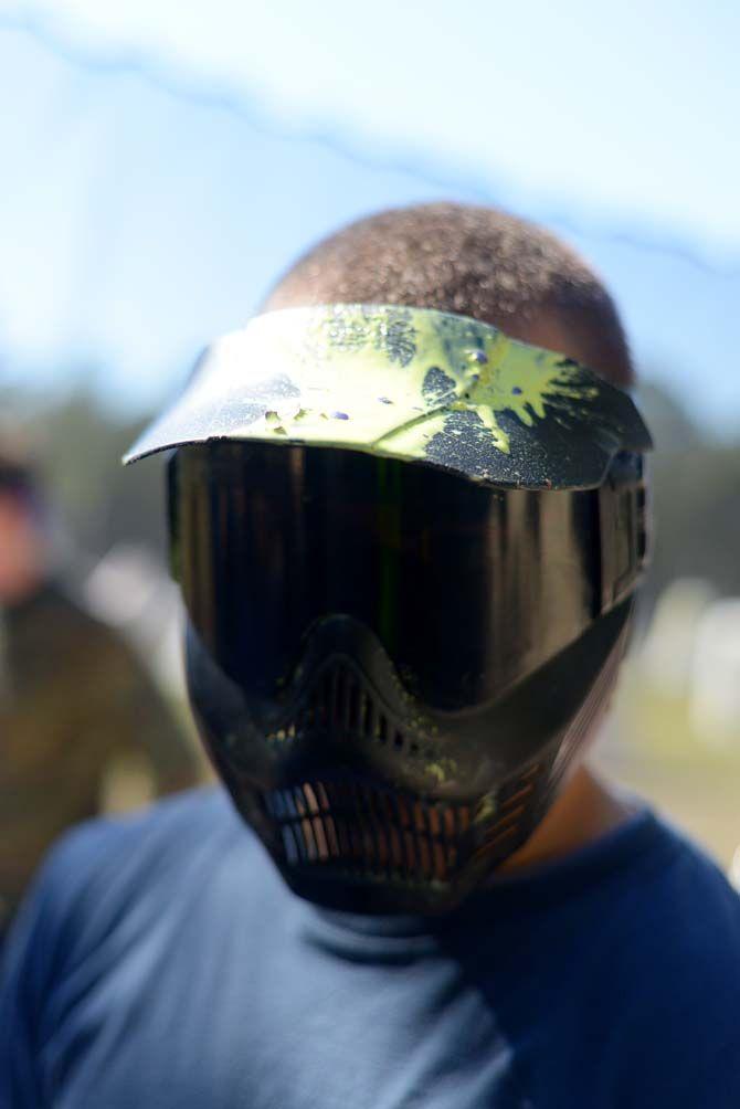 Paint covers the mask of Tiger Paintball member.