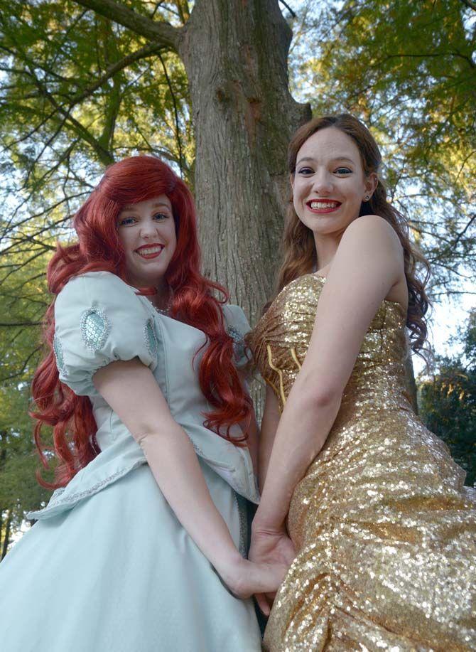 LSU junior digital advertising major, Reagan May (Mermaid Princess/left) poses with sophomore education major, Corinna Cherrier (Beauty/right), for May's business, started in July, called "Rent a Princess" where the girls are hired for birthday parties and other events