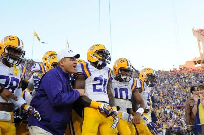 Les Miles and the LSU Tigers step onto the field in Tiger Stadium for the Homecoming Game against Ole Miss Saturday, October 25, 2014.