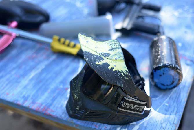 A mask sits covered in paint after Tiger Paintball plays a game of speedball at Paintball Command Sunday, October 19, 2014.