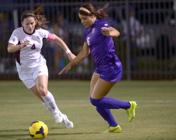 LSU freshman forward Jorian Baucom (5) runs the ball Friday at LSU soccer stadium where LSU lost to Texas A&amp;M 4-1.