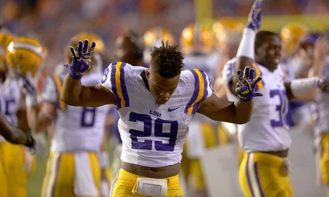 LSU sophomore saftey Rickey Jefferson (29) signifies the start of the forth quarter Saturday, October 11, 2014 during the Tigers' 30-27 victory in Ben Hill Griffin Stadium.