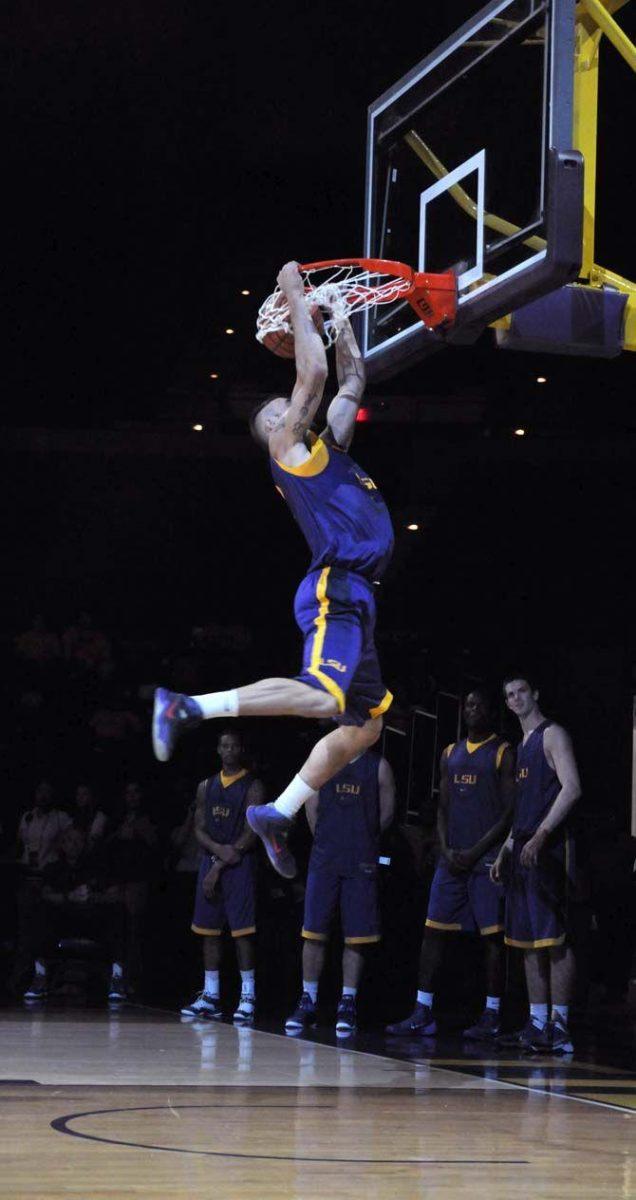 LSU men's basketball junior guard, Keith Hornsby (4), participates in the dunking contest at Basketball Bayou Madness in the PMAC on Friday, October 17.