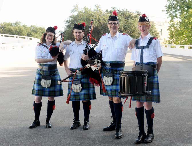 Members of the Baton Rouge Caledonian Pipes and Drums (left to right), Stan Masinter, Rosemary John, Thomas Martin and Ellis Jackson, perform Saturday, October 11 outside the PMAC.