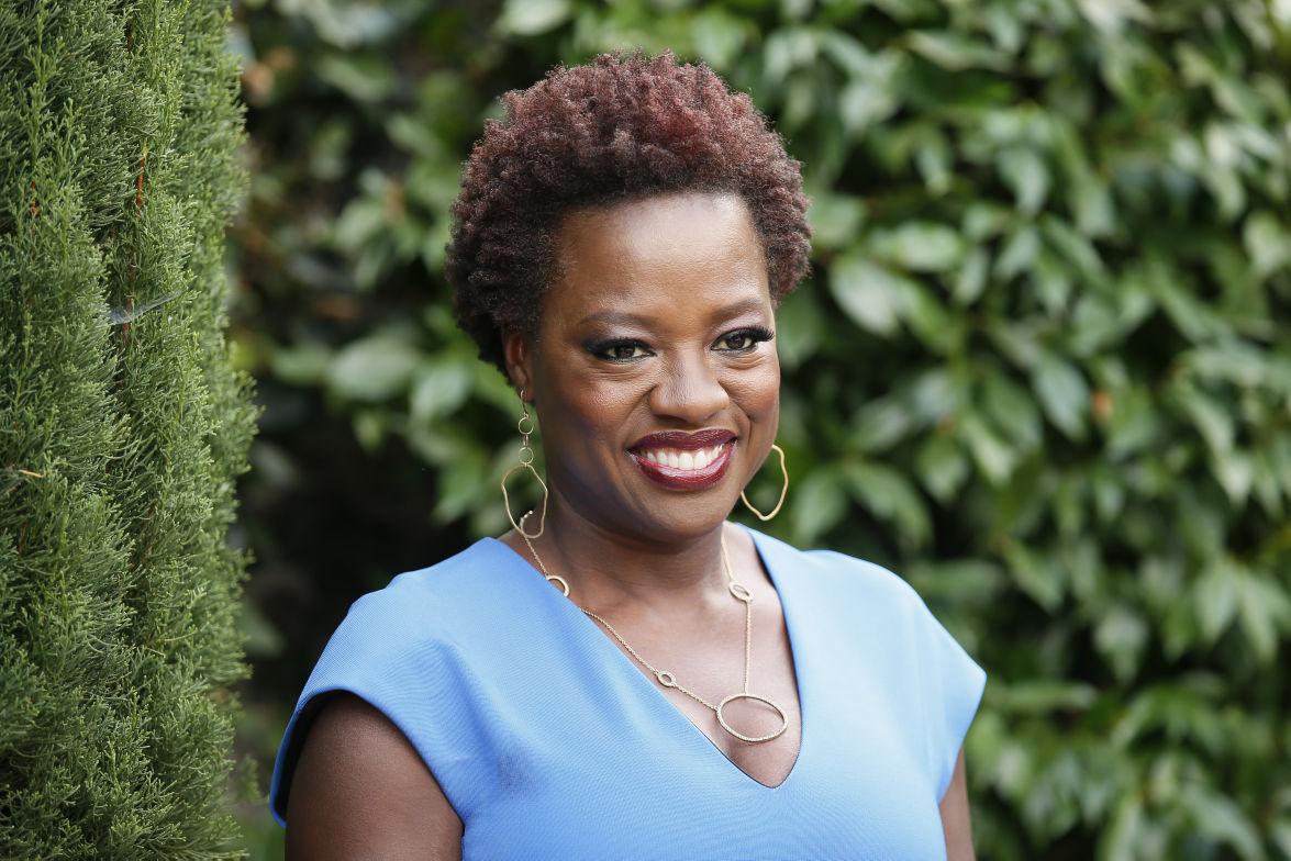 FILE - In this Sunday, Sept. 28, 2014 file photo, actress Viola Davis poses at The Rape Foundation's Annual Brunch at Greenacres in Beverly Hills, Calif. The 49-year-old actress stars as a defense attorney and law professor on the new ABC show &#8220;How to Get Away With Murder,&#8221; which premiered Thursday, Sept. 25, to 14 million viewers. Davis discussed her new show Sunday at a benefit for the Rape Treatment Center, which she became acquainted with through research for a role. (Photo by Danny Moloshok/Invision/AP, file)