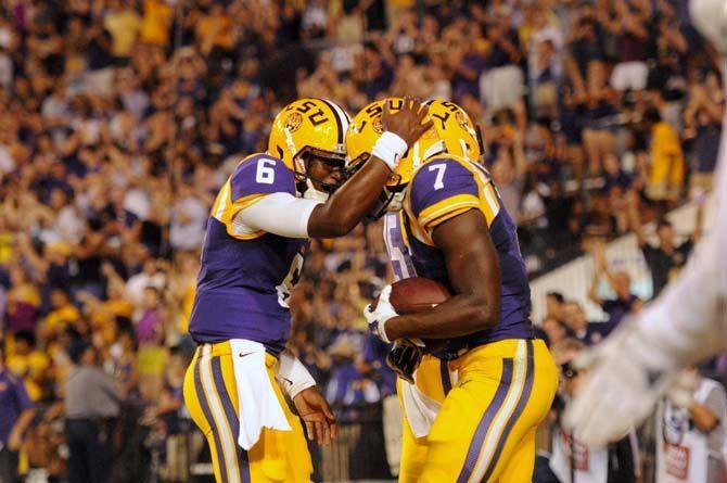 LSU freshman quarterback Brandon Harris congratulates freshman running back Leonard Fournette (7) after Fournette's touchdown Saturday, September 27, 2014 during the Tigers' 63-7 win against NMSU in Tiger Stadium.