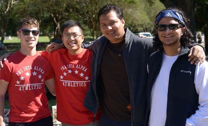 (Left to Right) Max Wheelock, David Hoang, Fernando Canchola and Erick Perdomo, members of Phi Iota Alpha, distributed information about the organization's LSU chapter at the Hispanic Cultural Showcase on Tuesday.