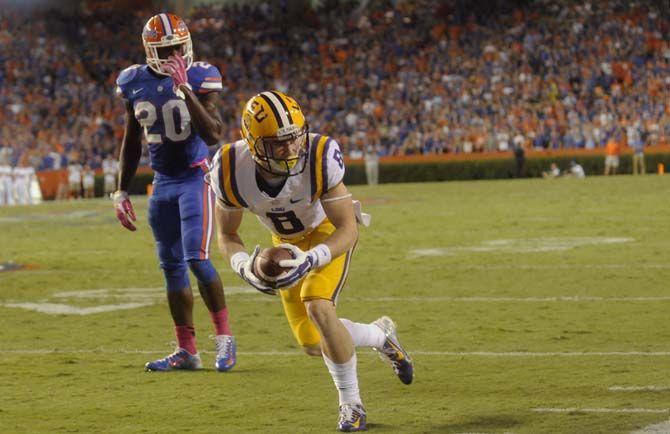 LSU freshman wide receiver Trey Quinn (8) celebrates a compleate pass trhown by sophomore quarterback Anthony Jennings (10) Saturday, October 11, 2014 during the Tigers' 30-27 victory in Ben Hill Griffin Stadium.