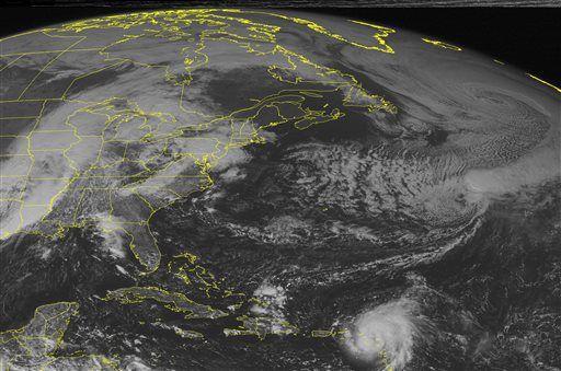 This NOAA satellite image taken Monday, Oct. 13, 2014 at 01:45 PM EDT shows a very strong area of low pressure over eastern Oklahoma and Arkansas. The associated warm front is moving into the Ohio Valley and Mid Atlantic with heavy rain and thunderstorms. The trailing cold front moves across Tennessee, Alabama and Louisiana with strong thunderstorms, including the threat for tornadoes.(AP Photo/Weather Underground)