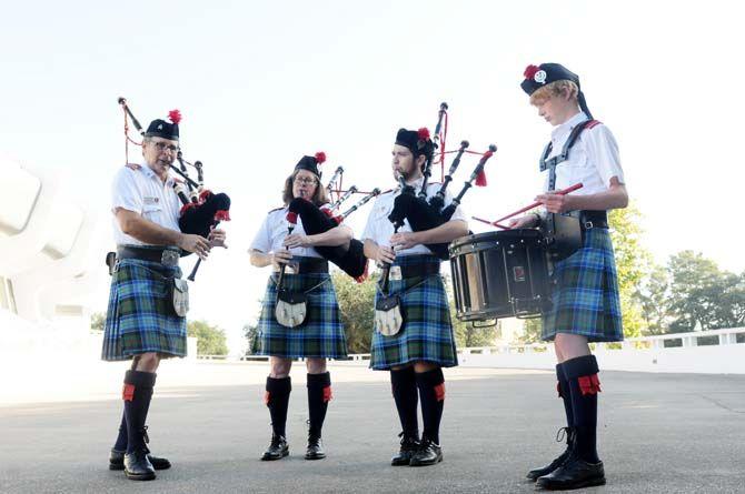 Members of the Baton Rouge Caledonian Pipes and Drums (left to right), Stan Masinter, Rosemary John, Thomas Martin and Ellis Jackson, perform Saturday, October 11 outside the PMAC.