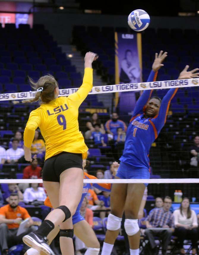 LSU senior middle blocker/right side Madi Mahaffey (9) spikes the ball during the Tigers' 1-3 defeat against Florida Friday, October 3, 2014 in the PMAC.