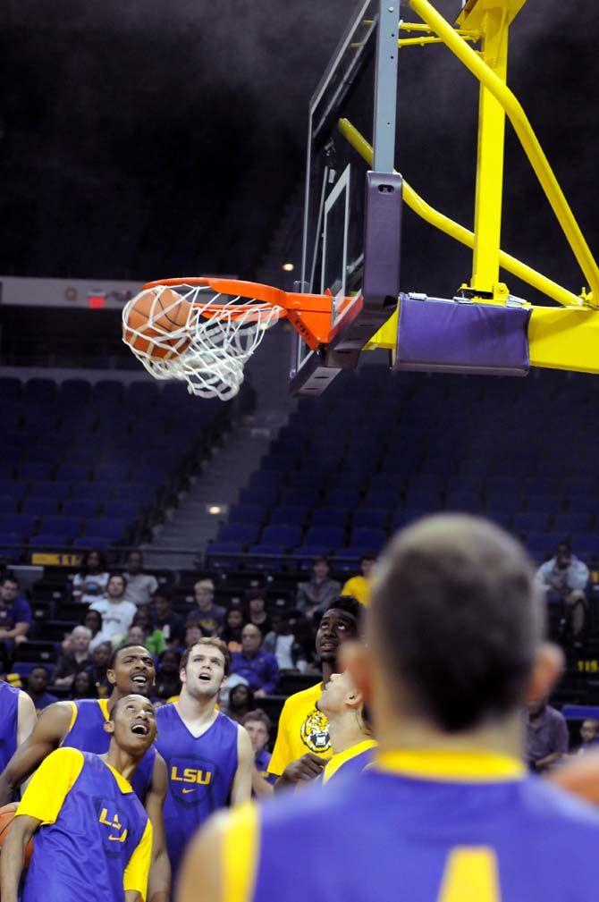 LSU men's basketball junior guard, Keith Hornsby (5), participates in Basketball Bayou Madness on Friday, October 17, in the PMAC while teammates look on.