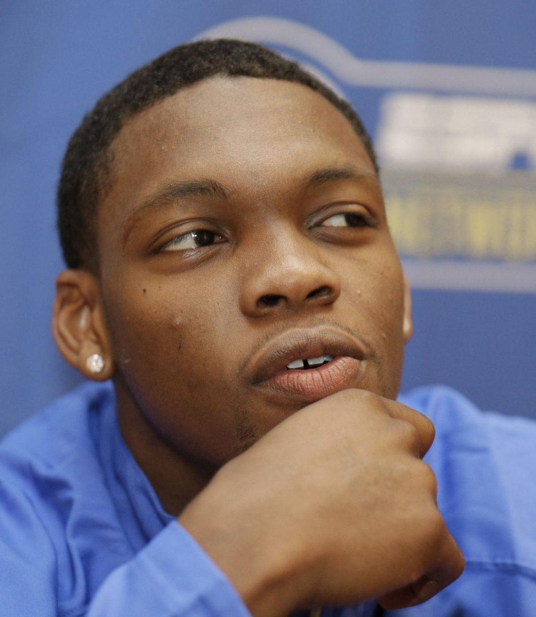 Florida's Michael Frazier II answers a question during a news conference at the Southeastern Conference NCAA men's college basketball media day in Charlotte, N.C., Wednesday, Oct. 22, 2014. (AP Photo/Chuck Burton)