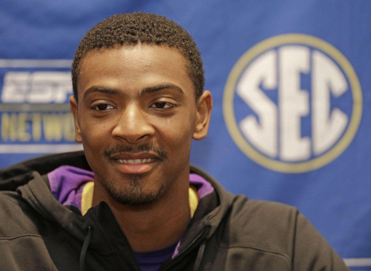 Louisiana State's Jordan Mickey answers a question during a news conference at the Southeastern Conference NCAA men's college basketball media day in Charlotte, N.C., Wednesday, Oct. 22, 2014. (AP Photo/Chuck Burton)