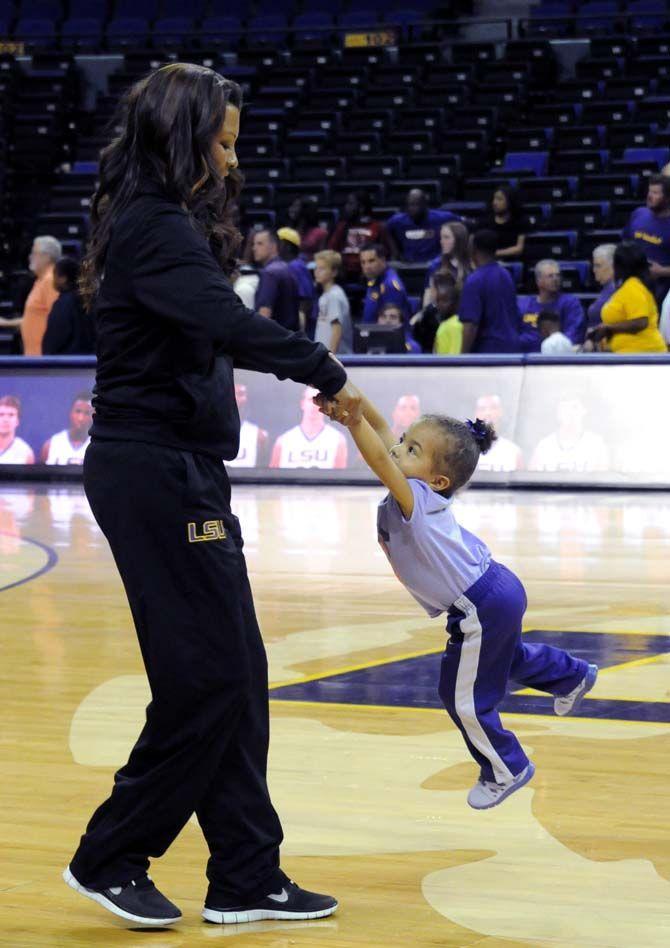 LSU women's basketball head coach Nikki Caldwell plays with daughter, Justice, after Basketball Bayou Madness in the PMAC on Friday, October 17.