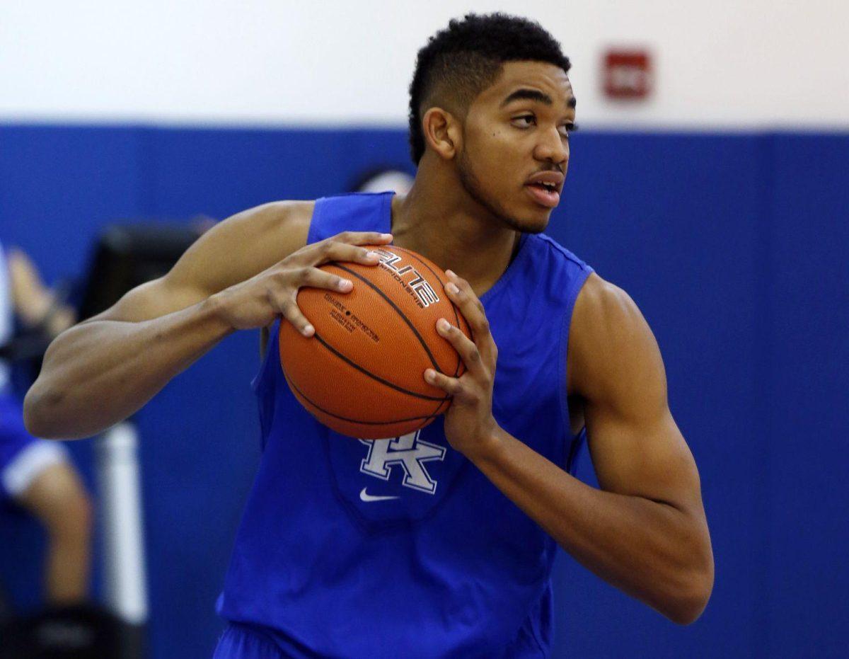 Kentucky's Karl-Anthony Towns pulls down a rebound in practice during the team's NCAA college basketball media day, Thursday, Oct. 16, 2014, in Lexington, Ky. (AP Photo/James Crisp)