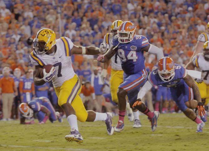 LSU freshman running back Leonard Fournette (7) runs the ball Saturday, October 11, 2014 during the Tigers' 30-27 victory in Ben Hill Griffin Stadium.